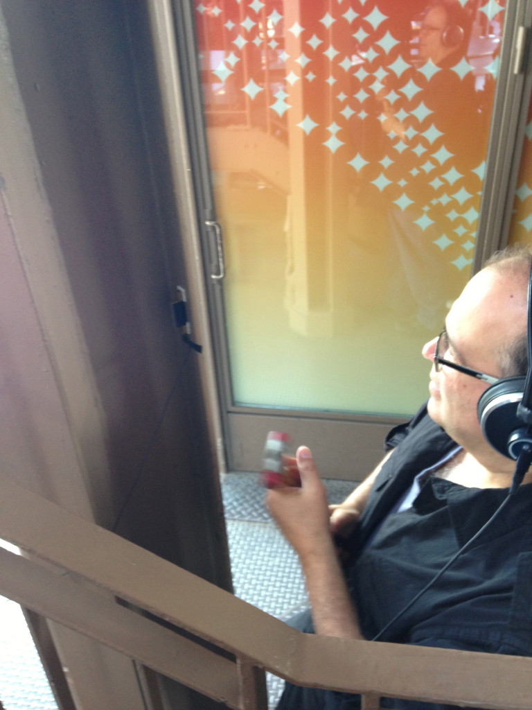 Joseph Bertolozzi recording at Eiffel Tower, near the boutique, 6.1.13 Image by Joe Popp IMG_7814