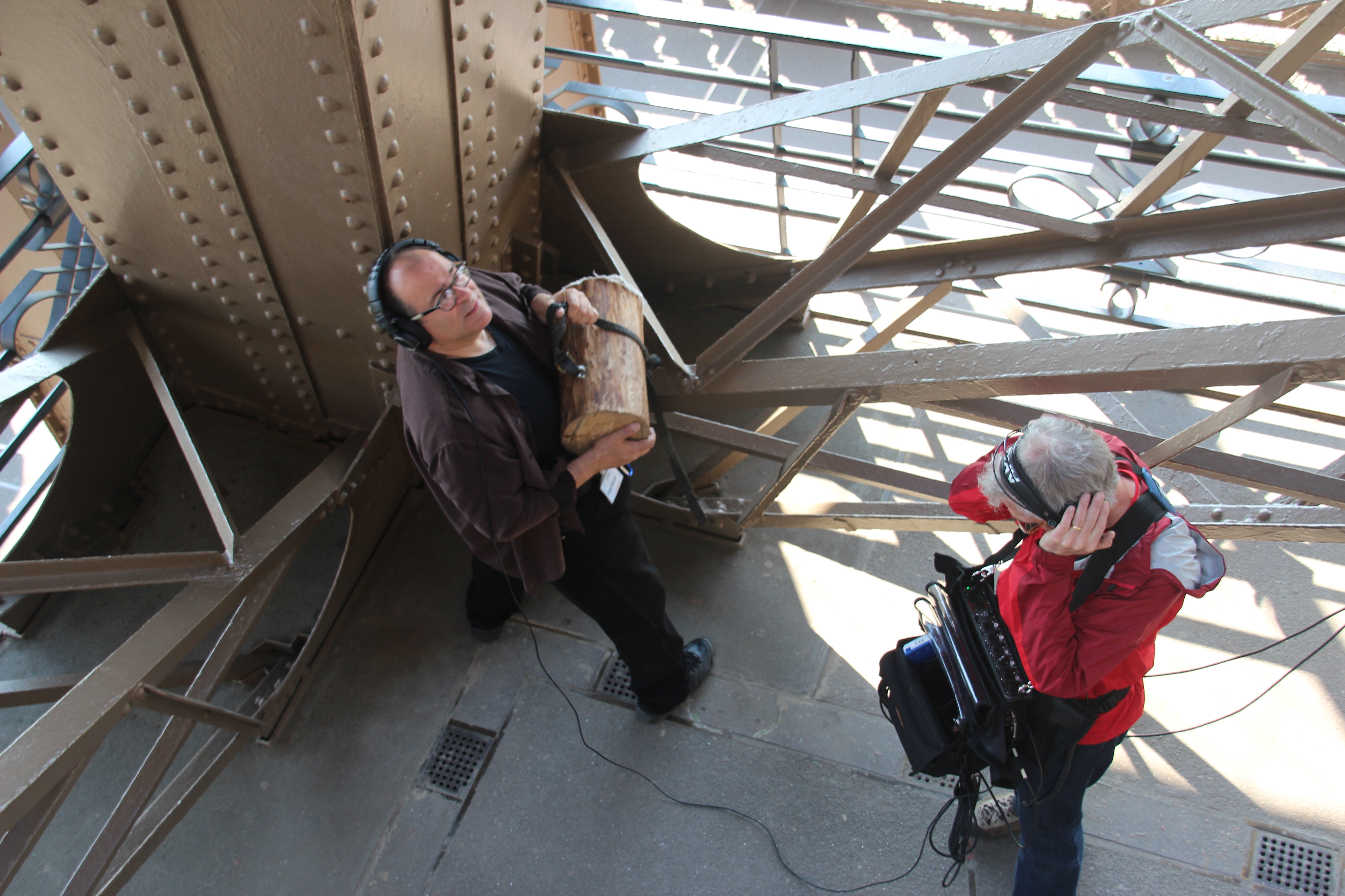 Joseph Bertolozzi (with log) & Paul Kozel at the Eiffel Tower recording the East Leg, Image (c) 2013, Franc Palaia